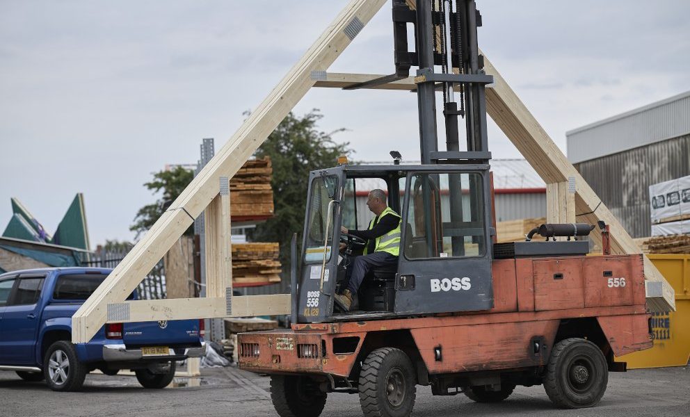 Roof trusses being loaded