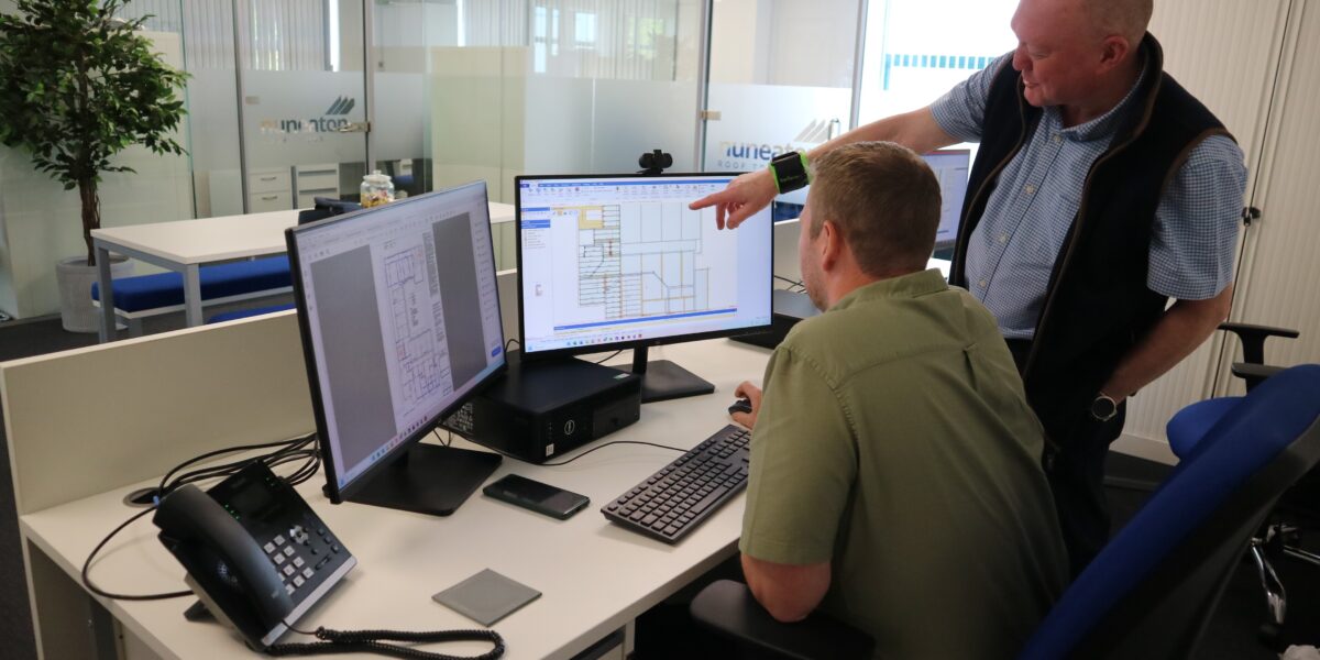 Nuneaton Roof Truss Design Team looking at computer screens
