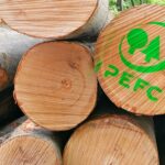 PEFC logo on sustainable wooden logs