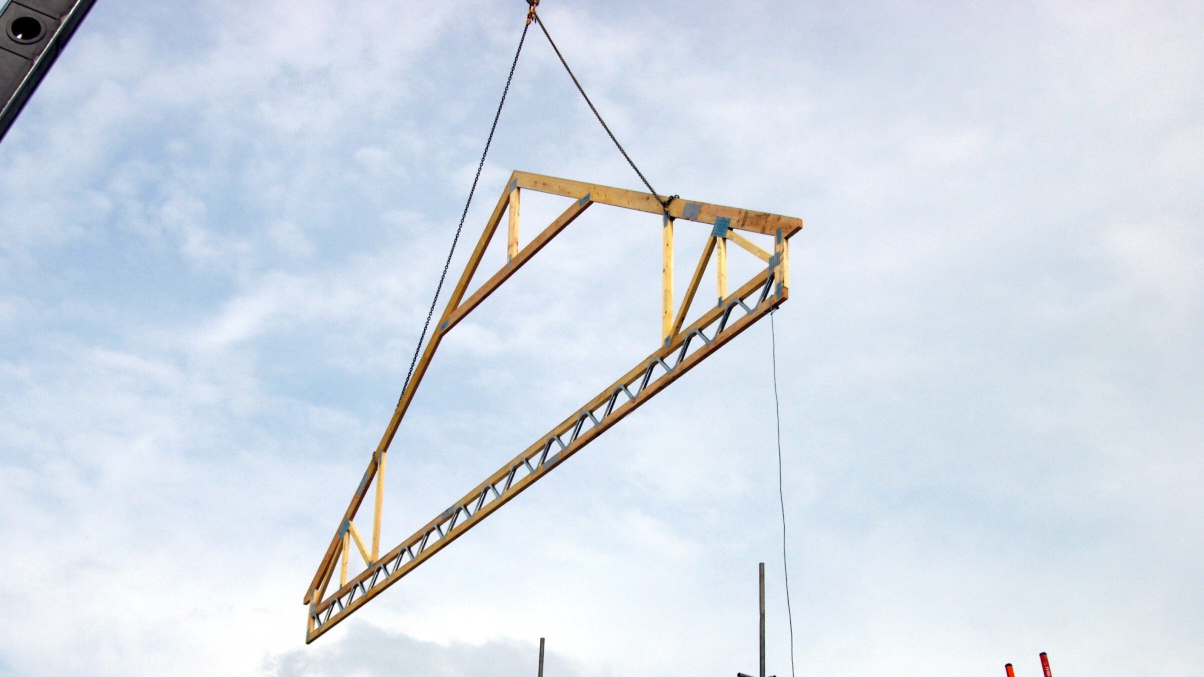 Posi Attic Truss being lifted into position on site Posi Attic Truss being lifted into position on site